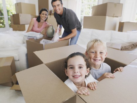 Packed boxes and furniture prepared for a local house move in Silvertown