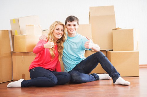 Local movers packing household items for a Silvertown home move